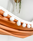 Indoor hammock for kids, little hammock™, kid’s hammock swing, terracotta color + Pom Pom trim, close up