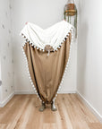 Indoor hammock for kids, little hammock™, kid’s hammock swing, sand dune color + Pom Pom trim, held up by child